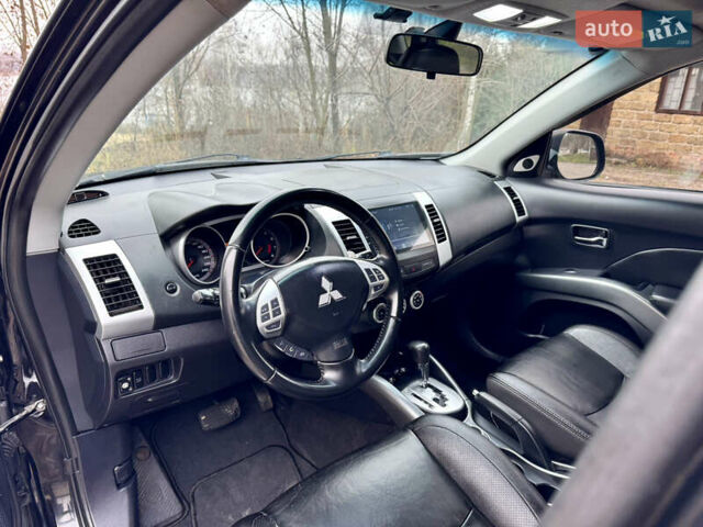 Чорний Міцубісі Аутлендер ХЛ, об'ємом двигуна 2.4 л та пробігом 229 тис. км за 9790 $, фото 10 на Automoto.ua