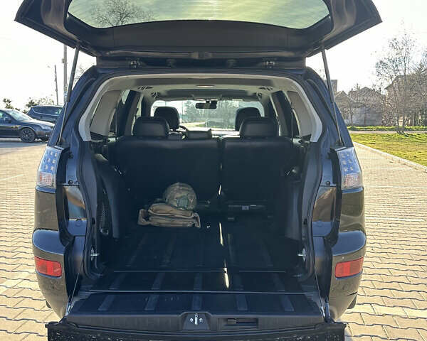 Черный Мицубиси Аутлендер ХЛ, объемом двигателя 2.4 л и пробегом 198 тыс. км за 11000 $, фото 10 на Automoto.ua