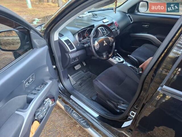 Черный Мицубиси Аутлендер ХЛ, объемом двигателя 2.4 л и пробегом 127 тыс. км за 10500 $, фото 18 на Automoto.ua