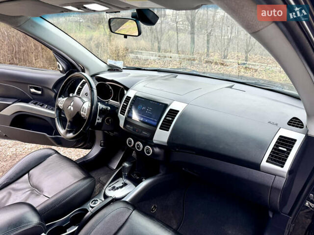 Чорний Міцубісі Аутлендер ХЛ, об'ємом двигуна 2.4 л та пробігом 229 тис. км за 9790 $, фото 19 на Automoto.ua