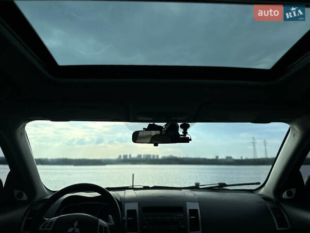 Черный Мицубиси Аутлендер ХЛ, объемом двигателя 2.4 л и пробегом 212 тыс. км за 9350 $, фото 11 на Automoto.ua