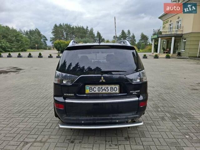 Черный Мицубиси Аутлендер ХЛ, объемом двигателя 2.4 л и пробегом 127 тыс. км за 10500 $, фото 13 на Automoto.ua