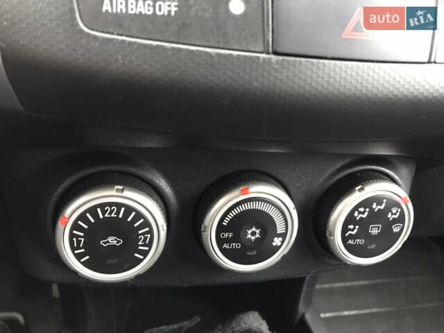 Чорний Міцубісі Аутлендер ХЛ, об'ємом двигуна 2 л та пробігом 306 тис. км за 9799 $, фото 21 на Automoto.ua