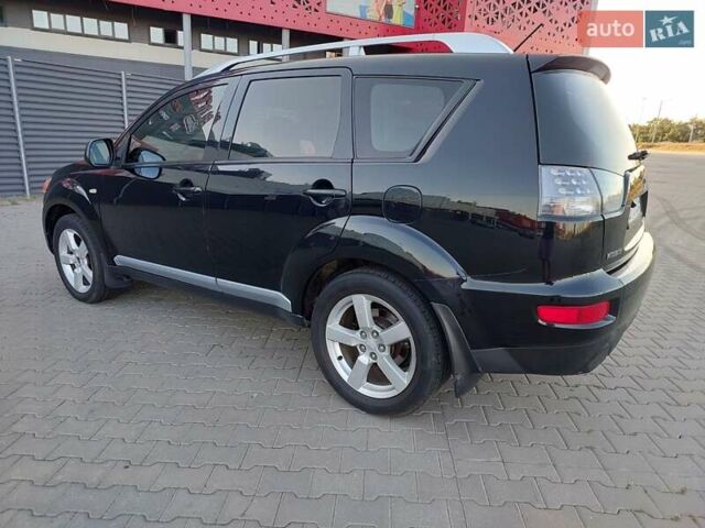 Чорний Міцубісі Аутлендер ХЛ, об'ємом двигуна 2.4 л та пробігом 181 тис. км за 8990 $, фото 10 на Automoto.ua