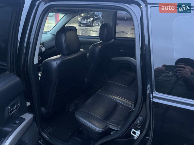 Чорний Міцубісі Аутлендер ХЛ, об'ємом двигуна 2.36 л та пробігом 230 тис. км за 9400 $, фото 14 на Automoto.ua