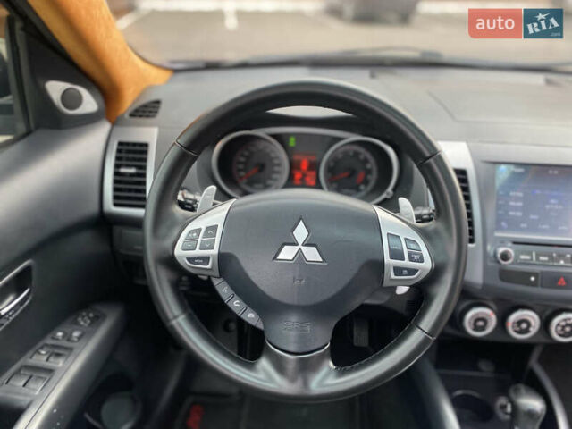 Черный Мицубиси Аутлендер ХЛ, объемом двигателя 3 л и пробегом 154 тыс. км за 8900 $, фото 38 на Automoto.ua