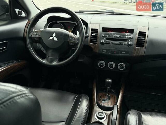 Черный Мицубиси Аутлендер ХЛ, объемом двигателя 2.36 л и пробегом 175 тыс. км за 9700 $, фото 22 на Automoto.ua
