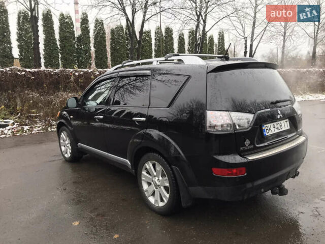 Чорний Міцубісі Аутлендер ХЛ, об'ємом двигуна 2 л та пробігом 306 тис. км за 9799 $, фото 18 на Automoto.ua