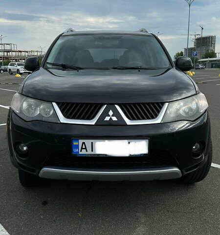 Черный Мицубиси Аутлендер ХЛ, объемом двигателя 2.4 л и пробегом 212 тыс. км за 9350 $, фото 44 на Automoto.ua