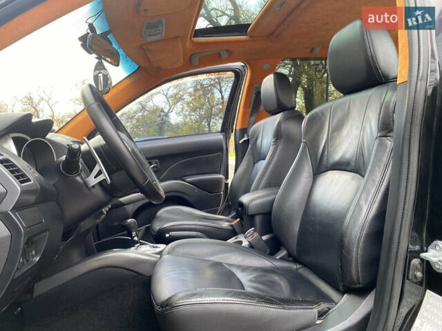 Черный Мицубиси Аутлендер ХЛ, объемом двигателя 3 л и пробегом 154 тыс. км за 8900 $, фото 37 на Automoto.ua