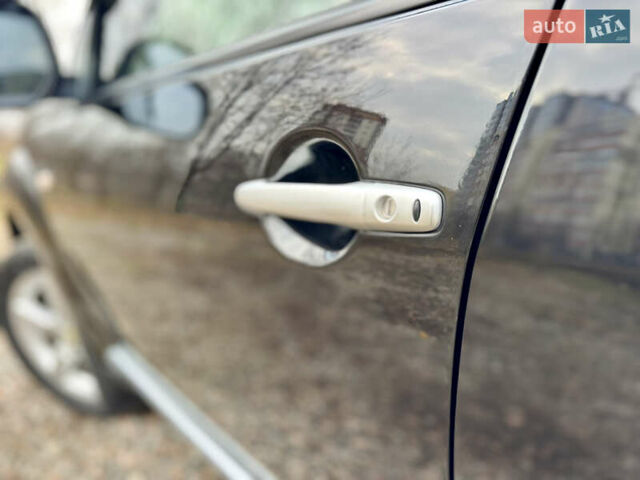 Чорний Міцубісі Аутлендер ХЛ, об'ємом двигуна 2.4 л та пробігом 229 тис. км за 9790 $, фото 8 на Automoto.ua