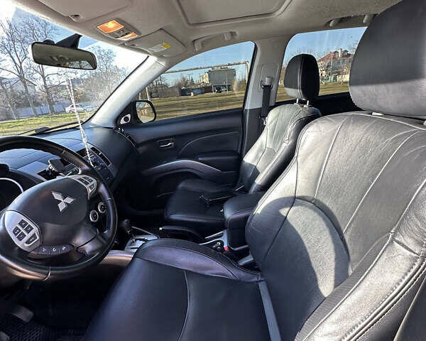 Черный Мицубиси Аутлендер ХЛ, объемом двигателя 2.4 л и пробегом 198 тыс. км за 11000 $, фото 18 на Automoto.ua