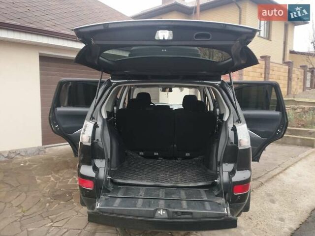 Черный Мицубиси Аутлендер ХЛ, объемом двигателя 2.36 л и пробегом 41 тыс. км за 12000 $, фото 8 на Automoto.ua