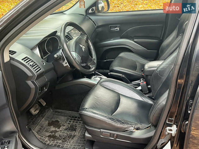 Черный Мицубиси Аутлендер ХЛ, объемом двигателя 3 л и пробегом 285 тыс. км за 9590 $, фото 26 на Automoto.ua