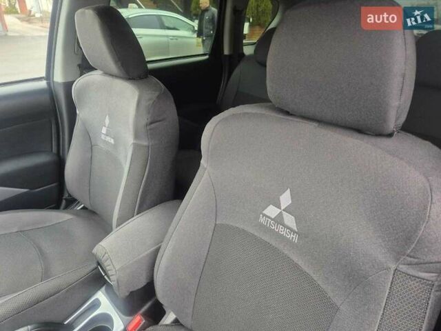 Черный Мицубиси Аутлендер ХЛ, объемом двигателя 2.36 л и пробегом 87 тыс. км за 11500 $, фото 8 на Automoto.ua