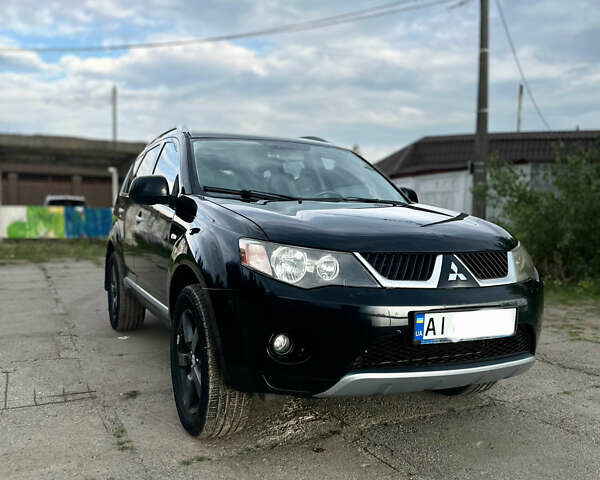 Черный Мицубиси Аутлендер ХЛ, объемом двигателя 2.4 л и пробегом 212 тыс. км за 9350 $, фото 32 на Automoto.ua
