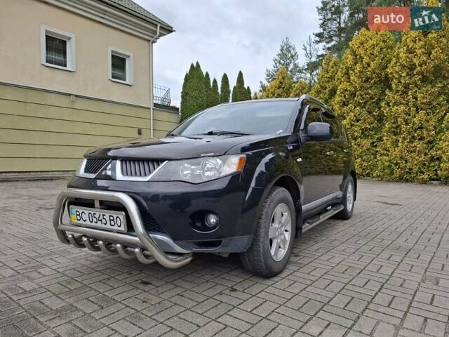 Черный Мицубиси Аутлендер ХЛ, объемом двигателя 2.4 л и пробегом 127 тыс. км за 10500 $, фото 3 на Automoto.ua