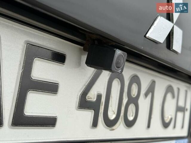 Черный Мицубиси Аутлендер ХЛ, объемом двигателя 2.36 л и пробегом 175 тыс. км за 9700 $, фото 8 на Automoto.ua