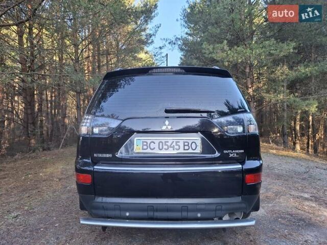 Черный Мицубиси Аутлендер ХЛ, объемом двигателя 2.4 л и пробегом 127 тыс. км за 10500 $, фото 20 на Automoto.ua