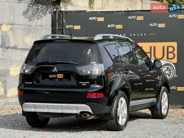 Чорний Міцубісі Аутлендер ХЛ, об'ємом двигуна 2.4 л та пробігом 104 тис. км за 10800 $, фото 5 на Automoto.ua