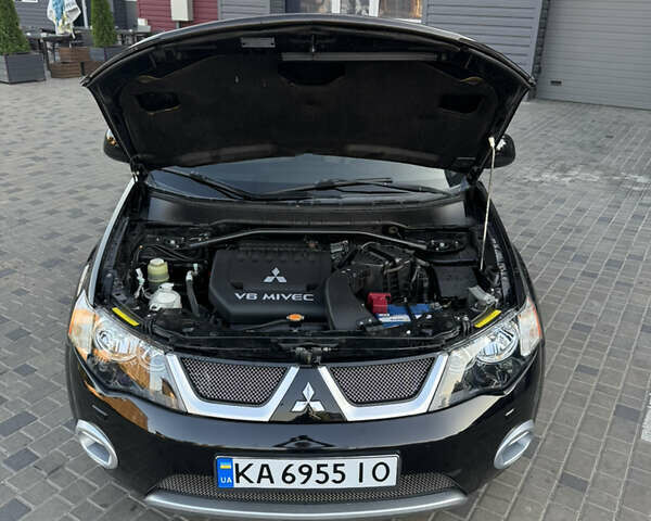 Чорний Міцубісі Аутлендер ХЛ, об'ємом двигуна 3 л та пробігом 243 тис. км за 12500 $, фото 16 на Automoto.ua