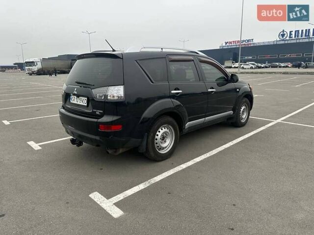 Черный Мицубиси Аутлендер ХЛ, объемом двигателя 2.36 л и пробегом 250 тыс. км за 10000 $, фото 10 на Automoto.ua
