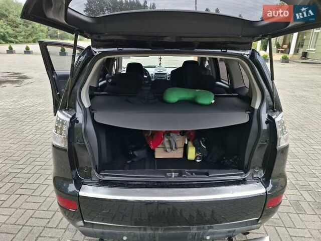 Черный Мицубиси Аутлендер ХЛ, объемом двигателя 2.4 л и пробегом 127 тыс. км за 10500 $, фото 40 на Automoto.ua