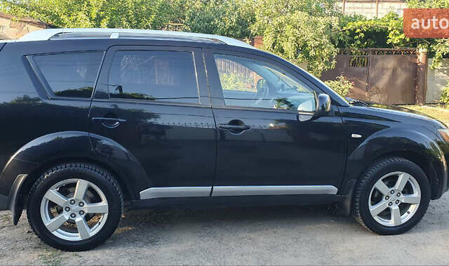 Чорний Міцубісі Аутлендер ХЛ, об'ємом двигуна 2.4 л та пробігом 325 тис. км за 7000 $, фото 13 на Automoto.ua