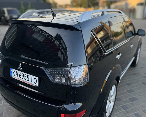 Чорний Міцубісі Аутлендер ХЛ, об'ємом двигуна 3 л та пробігом 243 тис. км за 12500 $, фото 6 на Automoto.ua