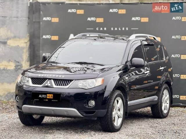 Черный Мицубиси Аутлендер ХЛ, объемом двигателя 3 л и пробегом 214 тыс. км за 9500 $, фото 4 на Automoto.ua