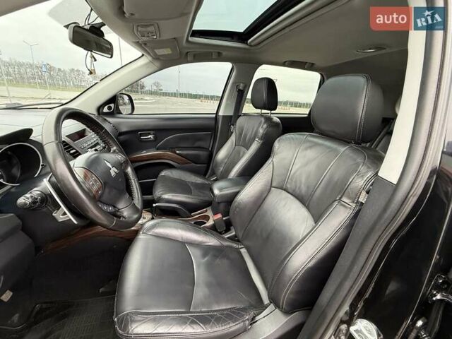 Черный Мицубиси Аутлендер ХЛ, объемом двигателя 2.36 л и пробегом 175 тыс. км за 9700 $, фото 20 на Automoto.ua