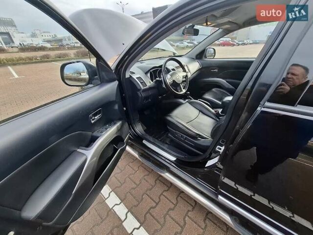 Черный Мицубиси Аутлендер ХЛ, объемом двигателя 2.36 л и пробегом 211 тыс. км за 10500 $, фото 8 на Automoto.ua