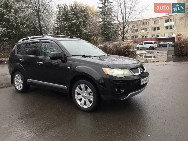Чорний Міцубісі Аутлендер ХЛ, об'ємом двигуна 2 л та пробігом 306 тис. км за 9799 $, фото 9 на Automoto.ua