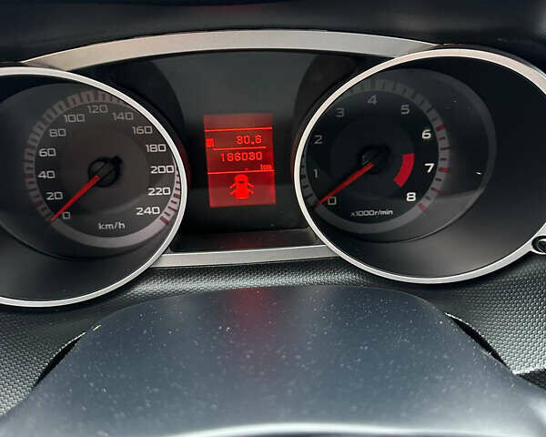 Черный Мицубиси Аутлендер ХЛ, объемом двигателя 2.4 л и пробегом 186 тыс. км за 8850 $, фото 14 на Automoto.ua