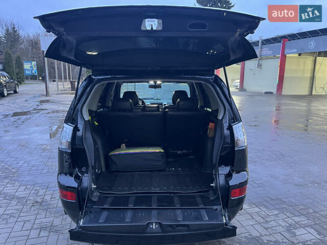 Чорний Міцубісі Аутлендер ХЛ, об'ємом двигуна 2.36 л та пробігом 230 тис. км за 9400 $, фото 15 на Automoto.ua