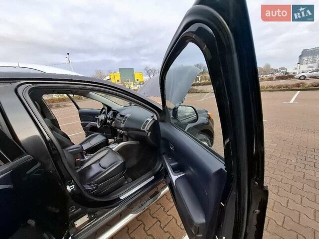 Черный Мицубиси Аутлендер ХЛ, объемом двигателя 2.36 л и пробегом 211 тыс. км за 10500 $, фото 20 на Automoto.ua