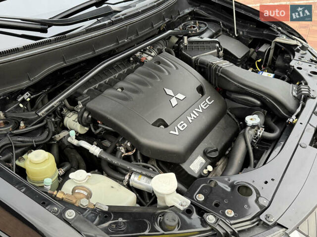 Черный Мицубиси Аутлендер ХЛ, объемом двигателя 3 л и пробегом 154 тыс. км за 8900 $, фото 20 на Automoto.ua