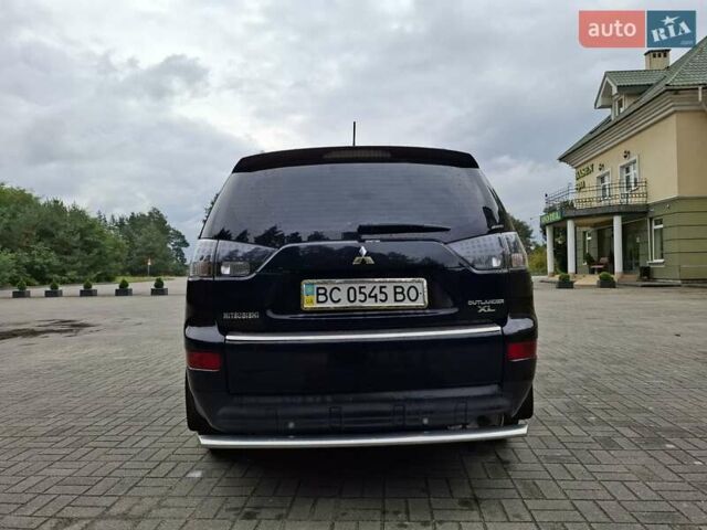 Черный Мицубиси Аутлендер ХЛ, объемом двигателя 2.4 л и пробегом 127 тыс. км за 10500 $, фото 12 на Automoto.ua