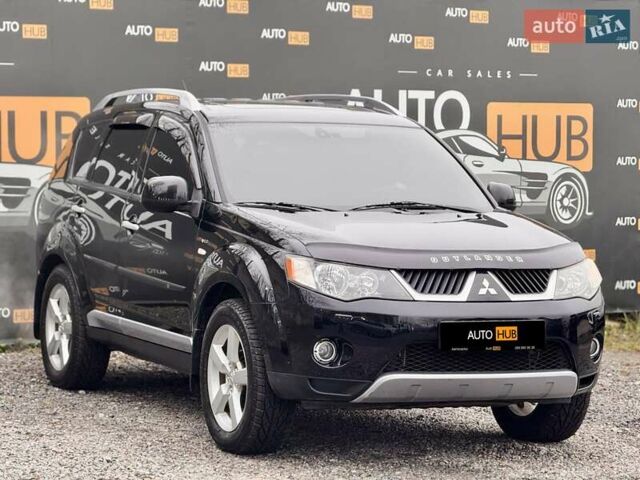 Черный Мицубиси Аутлендер ХЛ, объемом двигателя 3 л и пробегом 214 тыс. км за 9500 $, фото 2 на Automoto.ua