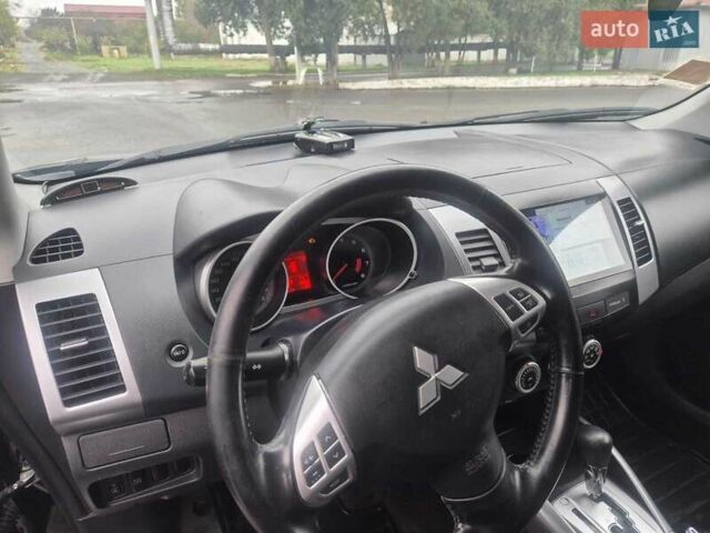 Черный Мицубиси Аутлендер ХЛ, объемом двигателя 2.36 л и пробегом 87 тыс. км за 11500 $, фото 11 на Automoto.ua