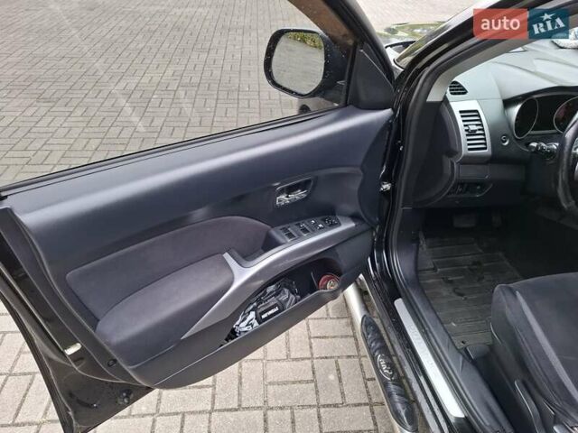 Черный Мицубиси Аутлендер ХЛ, объемом двигателя 2.4 л и пробегом 127 тыс. км за 10500 $, фото 29 на Automoto.ua