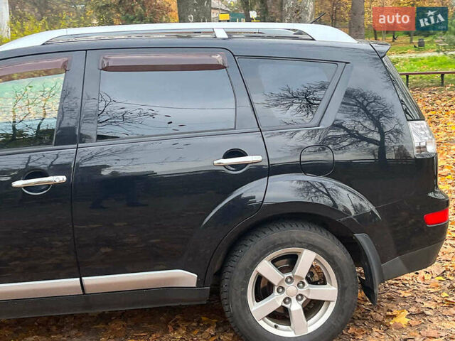 Черный Мицубиси Аутлендер ХЛ, объемом двигателя 3 л и пробегом 285 тыс. км за 9590 $, фото 5 на Automoto.ua
