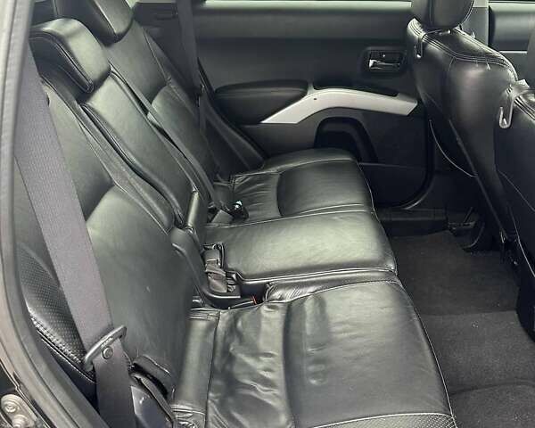 Черный Мицубиси Аутлендер ХЛ, объемом двигателя 2.36 л и пробегом 250 тыс. км за 10000 $, фото 21 на Automoto.ua