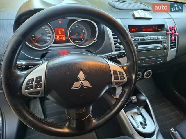 Черный Мицубиси Аутлендер ХЛ, объемом двигателя 2.4 л и пробегом 127 тыс. км за 10500 $, фото 26 на Automoto.ua