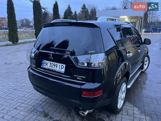 Чорний Міцубісі Аутлендер ХЛ, об'ємом двигуна 2.36 л та пробігом 230 тис. км за 9400 $, фото 3 на Automoto.ua