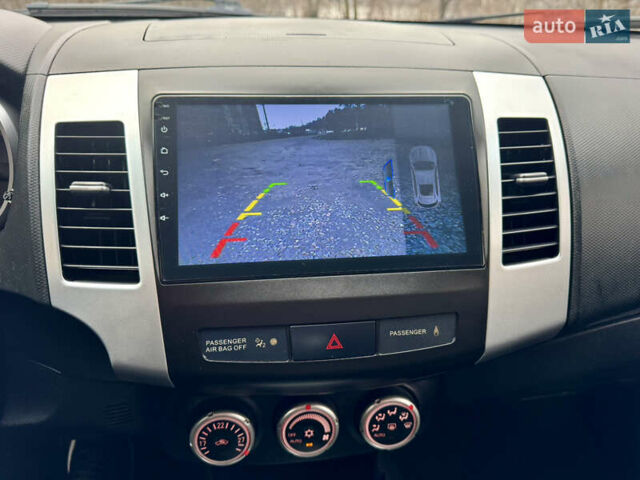 Чорний Міцубісі Аутлендер ХЛ, об'ємом двигуна 2.4 л та пробігом 229 тис. км за 9790 $, фото 22 на Automoto.ua