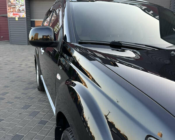 Чорний Міцубісі Аутлендер ХЛ, об'ємом двигуна 3 л та пробігом 243 тис. км за 12500 $, фото 28 на Automoto.ua