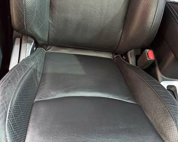 Черный Мицубиси Аутлендер ХЛ, объемом двигателя 2.4 л и пробегом 212 тыс. км за 9350 $, фото 3 на Automoto.ua