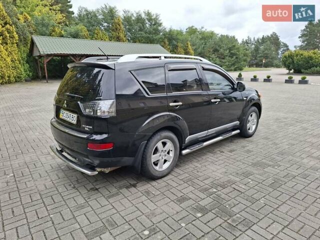 Черный Мицубиси Аутлендер ХЛ, объемом двигателя 2.4 л и пробегом 127 тыс. км за 10500 $, фото 10 на Automoto.ua