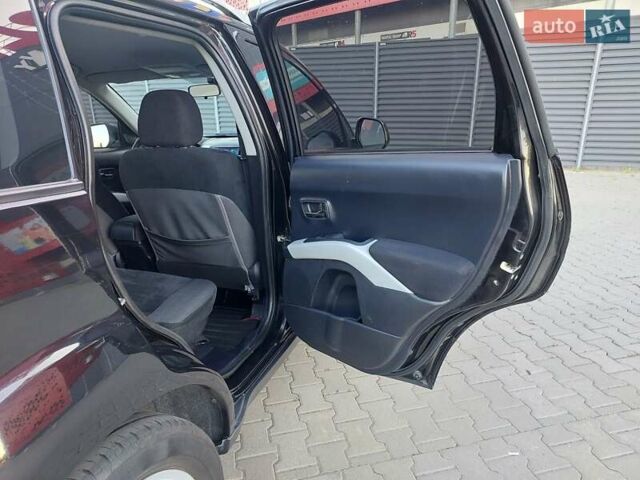 Чорний Міцубісі Аутлендер ХЛ, об'ємом двигуна 2.4 л та пробігом 181 тис. км за 8990 $, фото 14 на Automoto.ua